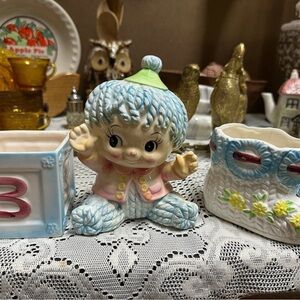 Vintage Ceramic Figurine with Blue and Pink Outfit